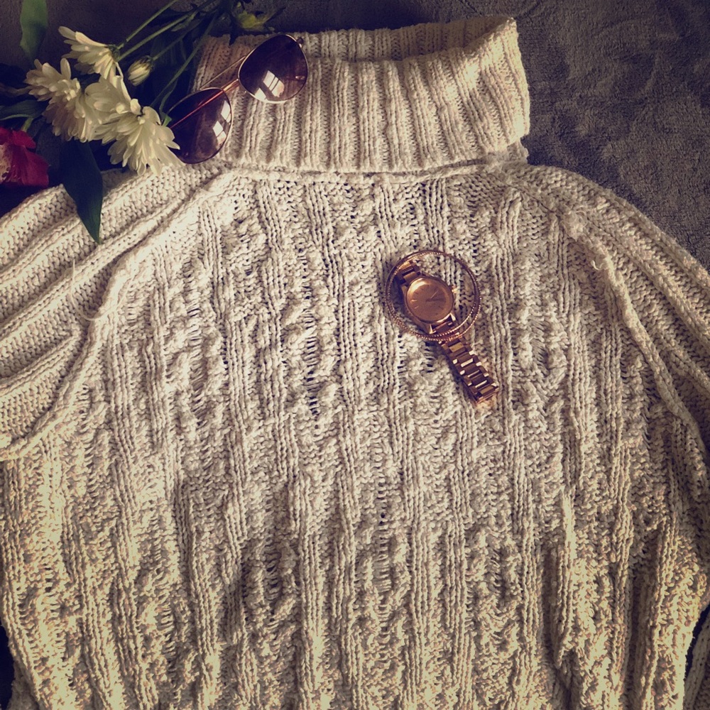 Knit sweater with an open back